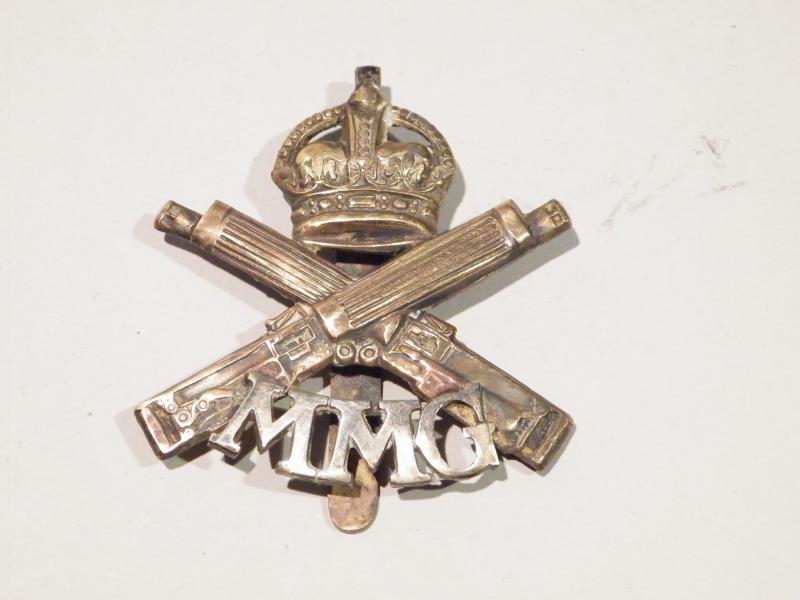 Scarce WW1 Motor Machine Gun Corps Cap Badge.