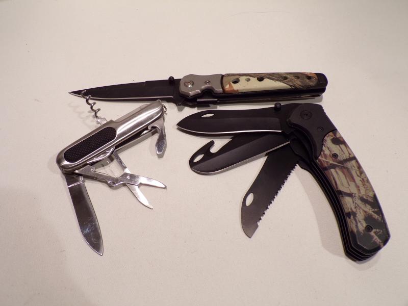Two Multi Bladed Pocket Knives and one Other