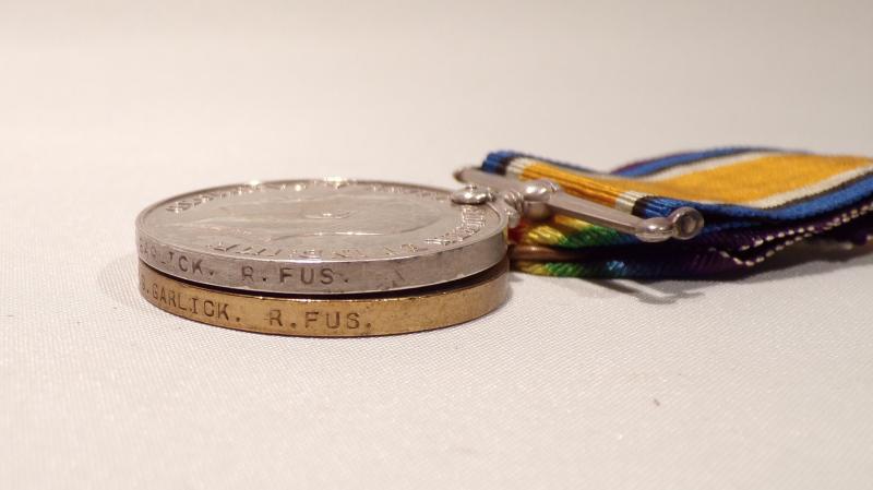 WW1 Medal pair to Garlick Royal Fusiliers.