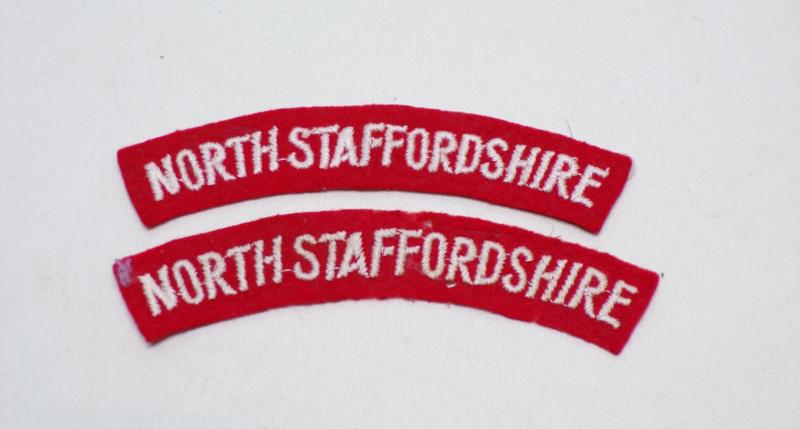 Pair WW2 North Stafford Shoulder Badges.