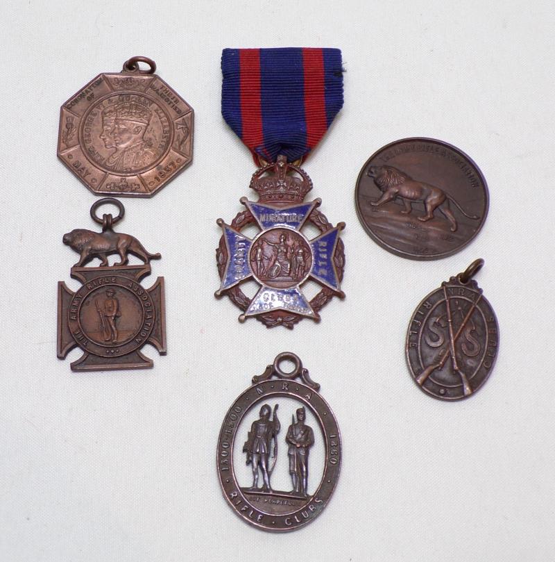 Collection of Six Rifle Clubs Pendants and Medal