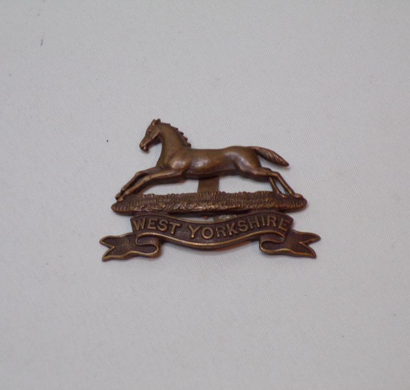 WW1 West Yorkshire Regiment Officers Cap Badge.